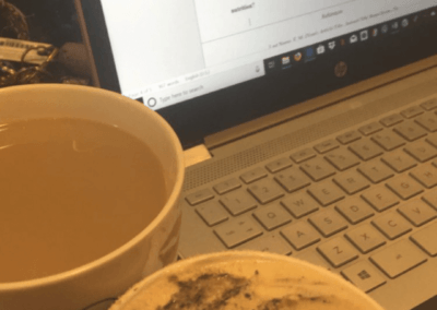 coffee cups by computer
