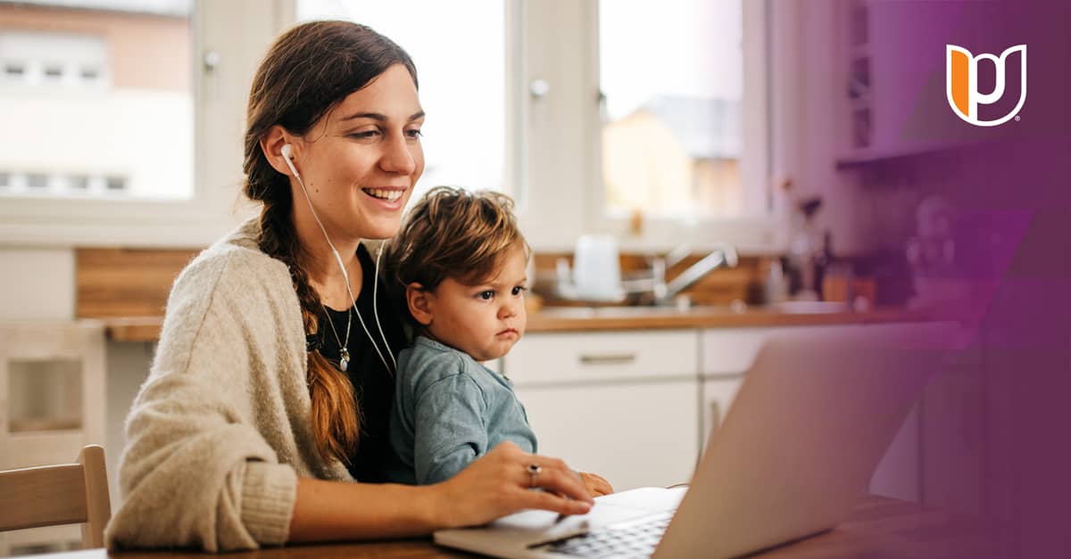 Mother Studying on Laptop with Child
