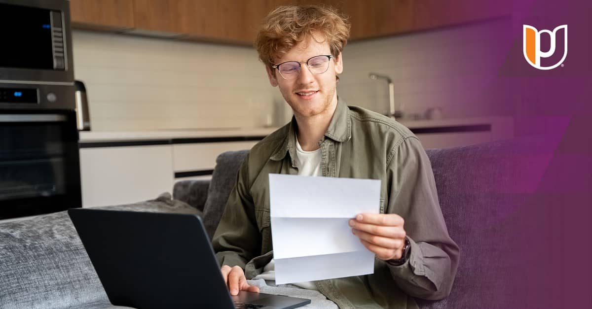 Man Viewing Student Loan Letter
