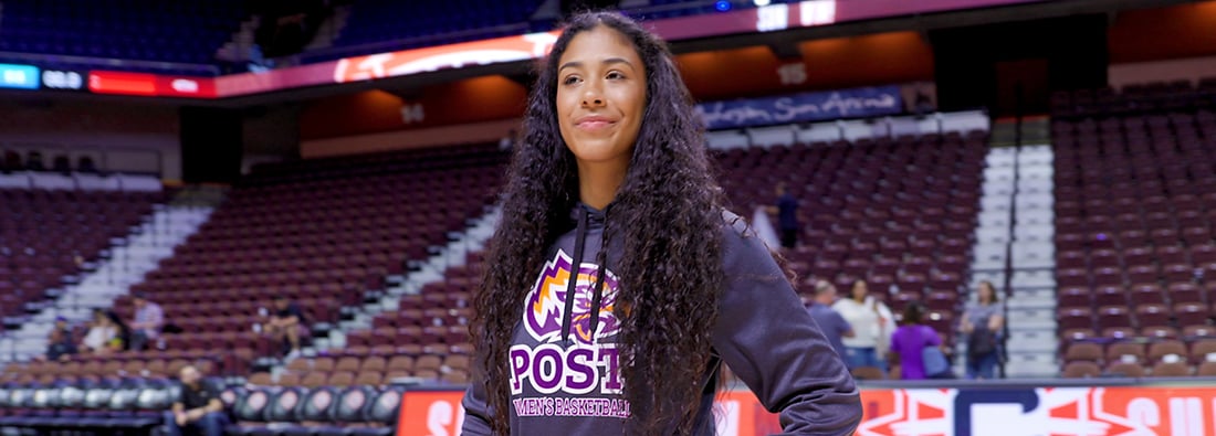 Tai Pagan stands proud in the Mohegan Sun Arena